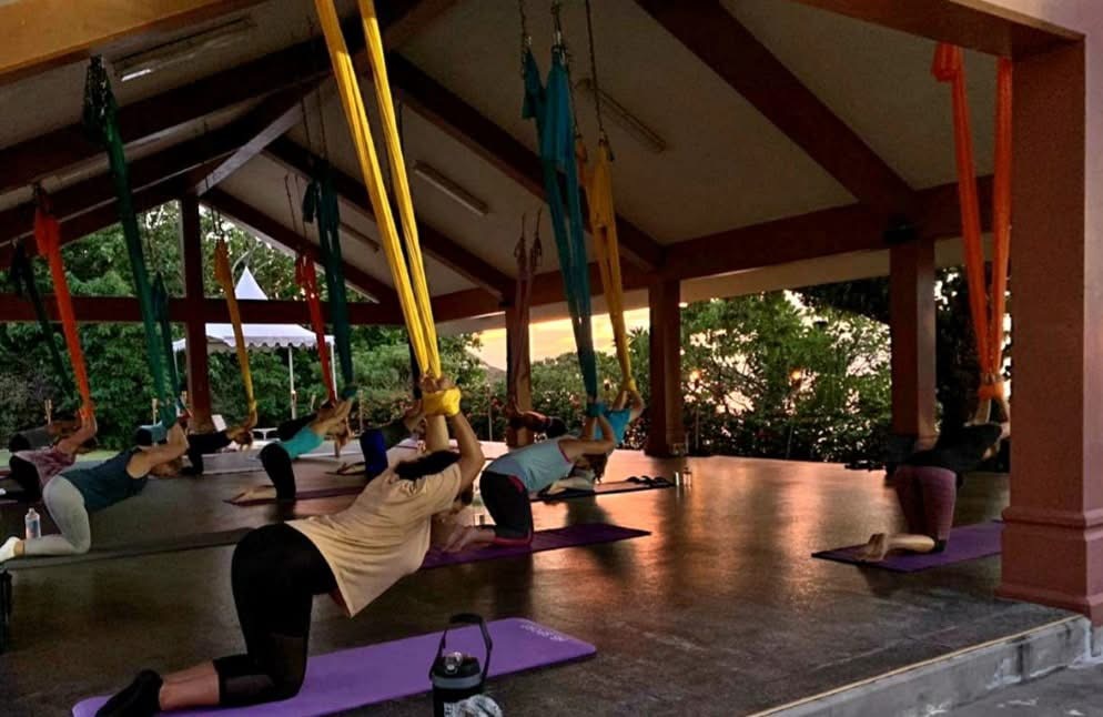 Sunset stretch class in the pavilion